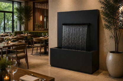Black powder-coated 42-inch vertical wall fountain with trough spillway, front view
