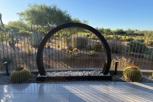 Valyrian Designs patent-pending black half circle rain curtain fountain made from powder-coated 304 stainless steel